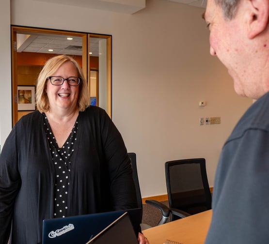 Omaha IT support provider tech helping a client with their SMB technology systems.
