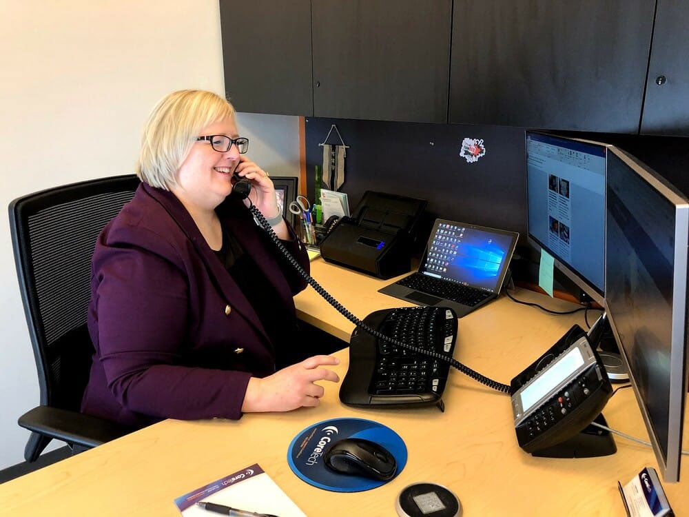 Omaha IT support provider tech helping a client with their SMB technology systems.